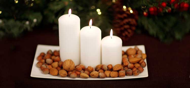 centros de mesa con velas para navidad frutos secos